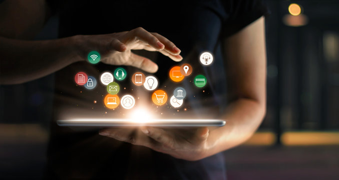 Tablet with glowing digital marketing icons — what is Answer Engine Optimization (AEO)